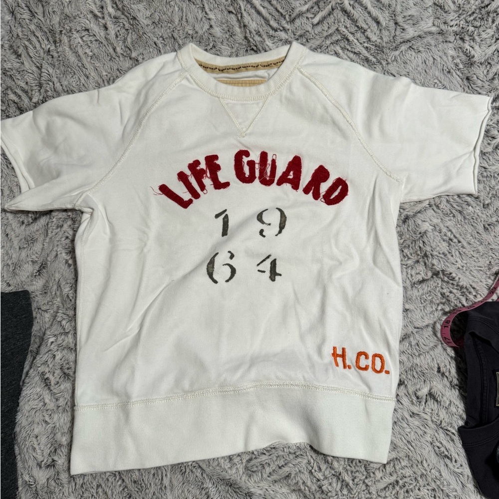 Hollister White 'LIFE GUARD' Graphic mens Sweatshirt with Red and Orange Accents